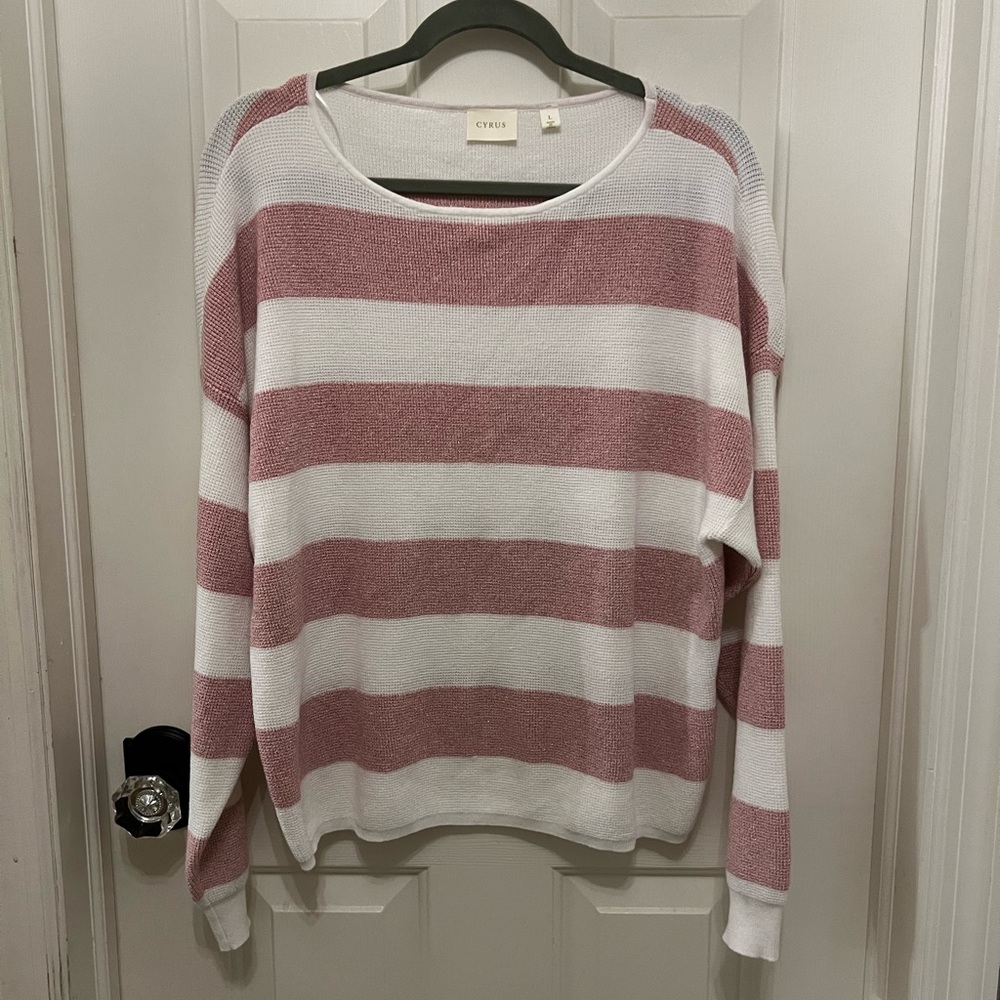 Brand new, no tags.  Casual striped women’s  sweater.